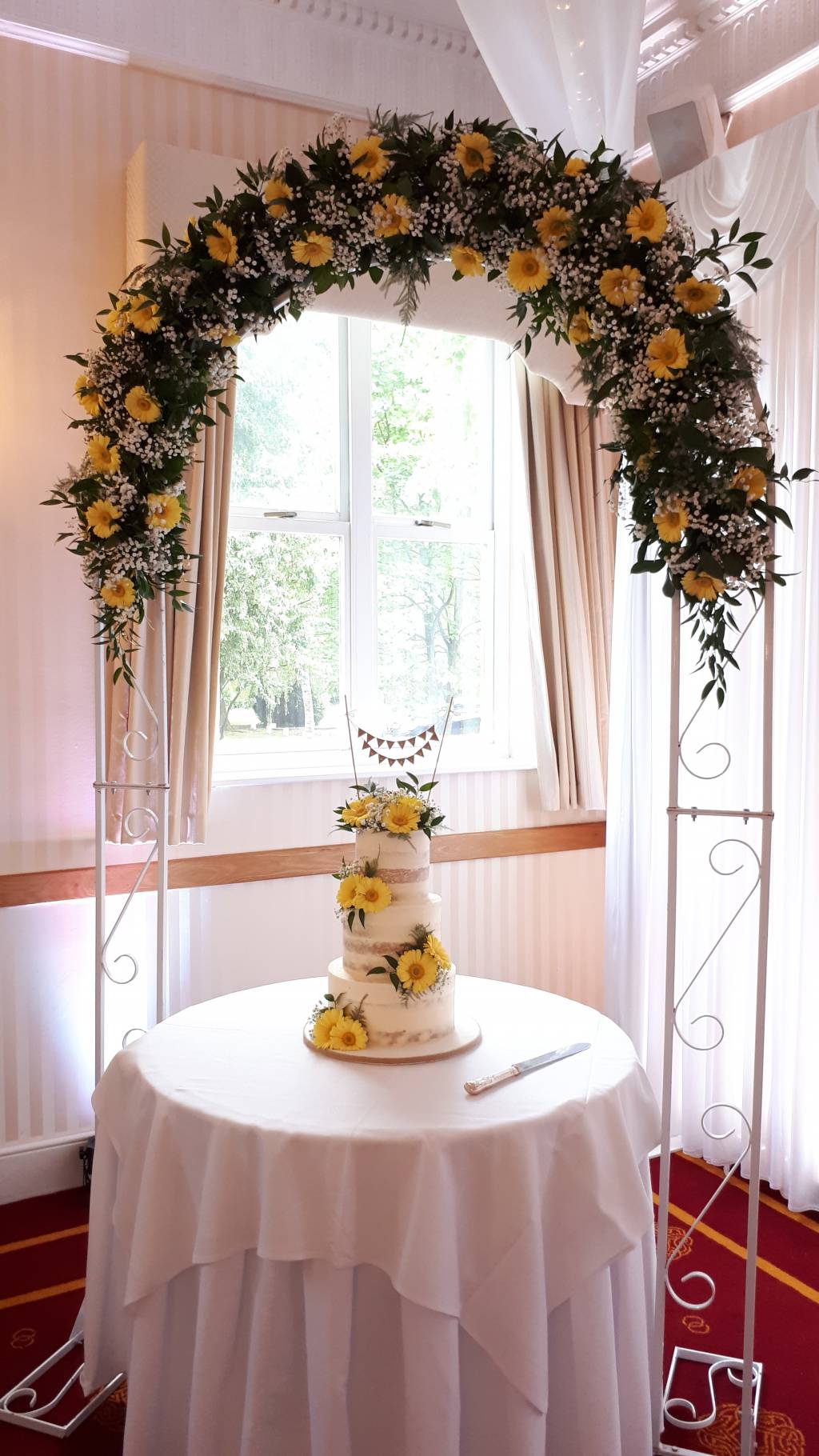 Image of a wedding flower arch