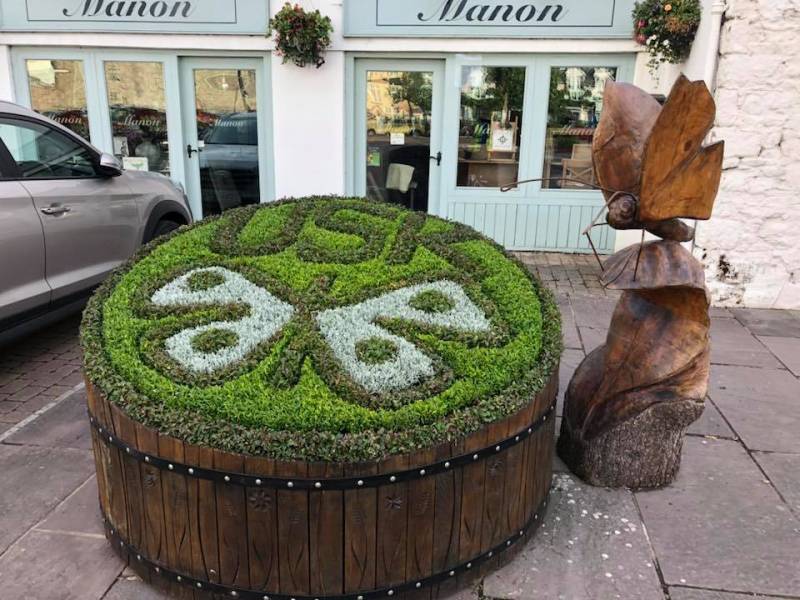 Image of one of the many (and very imaginative) planters in the town. ©  Usk in Bloom