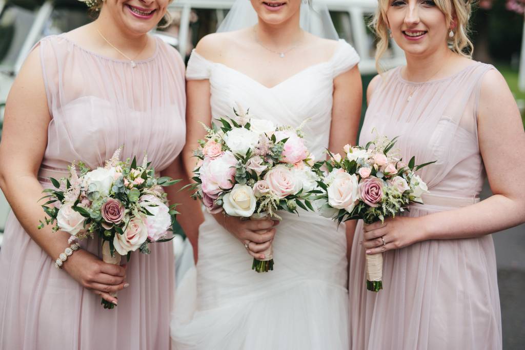 Image of a bride and her bridesmaids